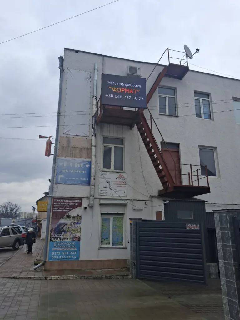 Building with fire escape sign